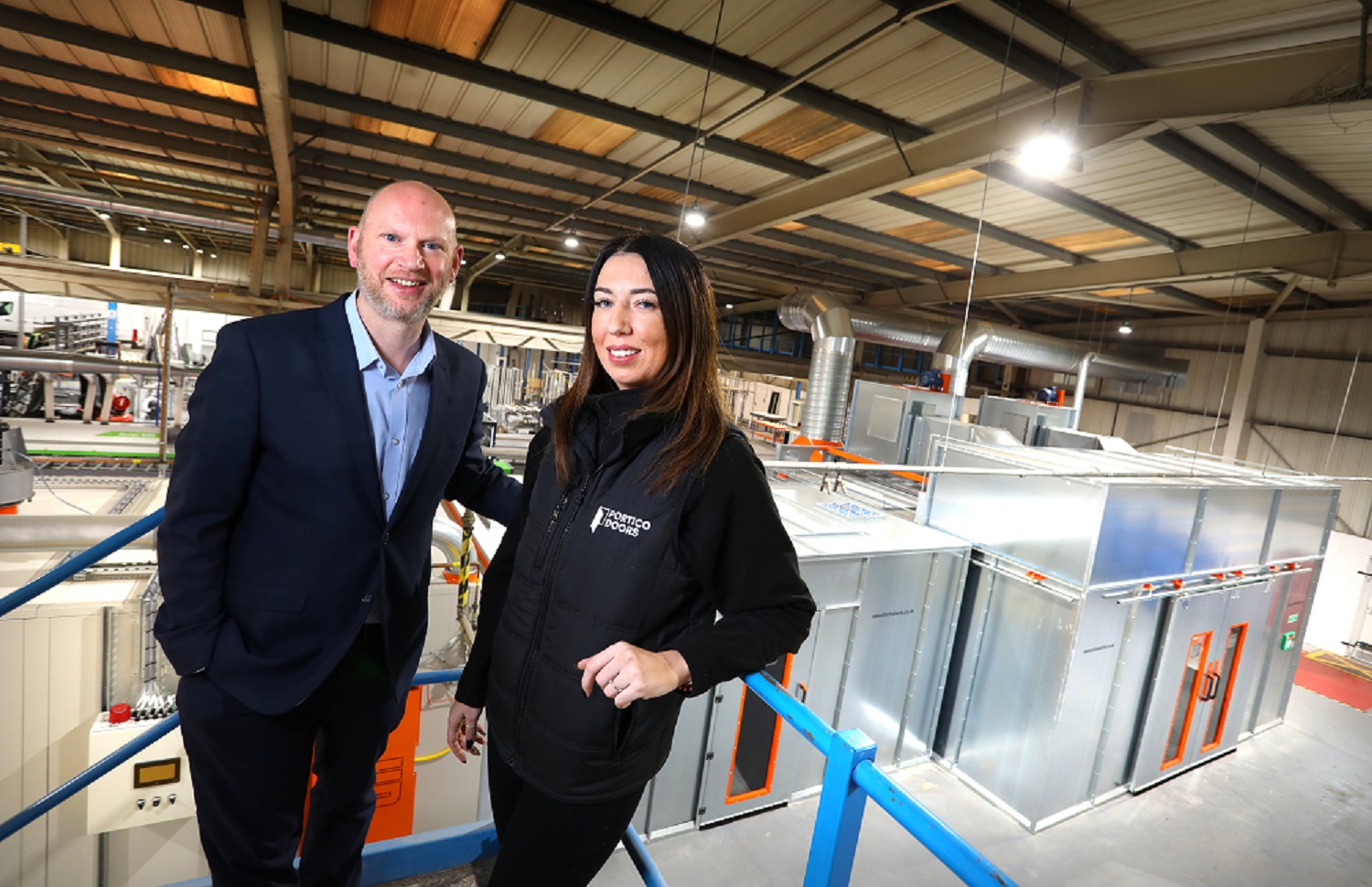 Advantex’s Scott Duncan (left) and Portico Doors’ Charlotte Craggs mark the completion of the installation of a turnkey IT solution at the Washington door manufactured low res-4e74e17a