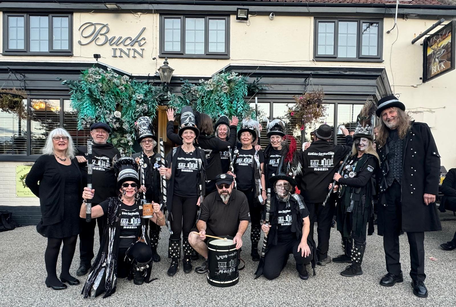 Members of the Locos In Motion Border Morris side