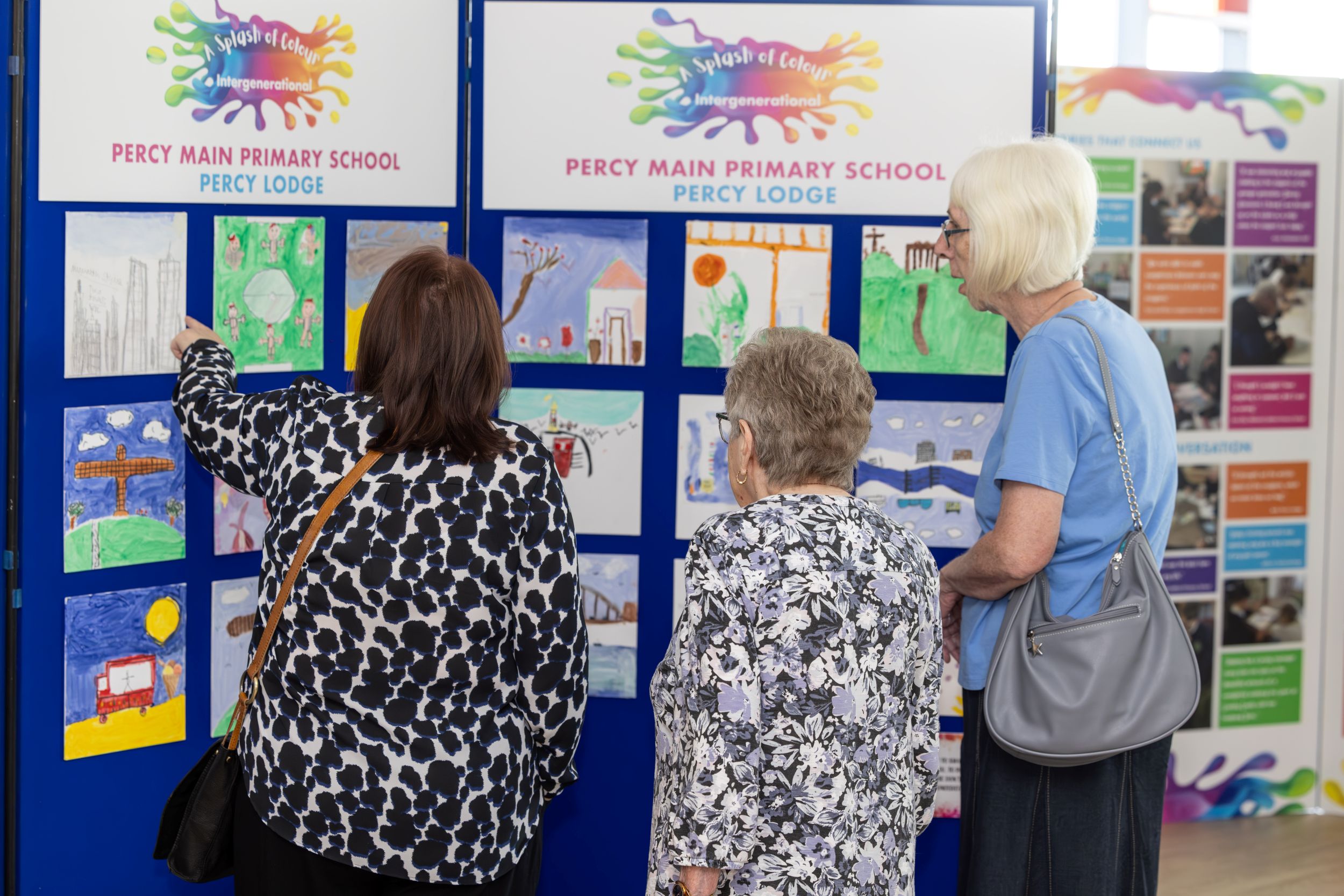 Visitors to the Splash Of Colour Intergenerational exhibition at Wallsend Library & Customer First Centre